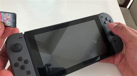 nintendo switch insert game card.